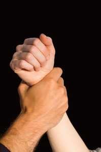 womans wrist held by man 13339 64152